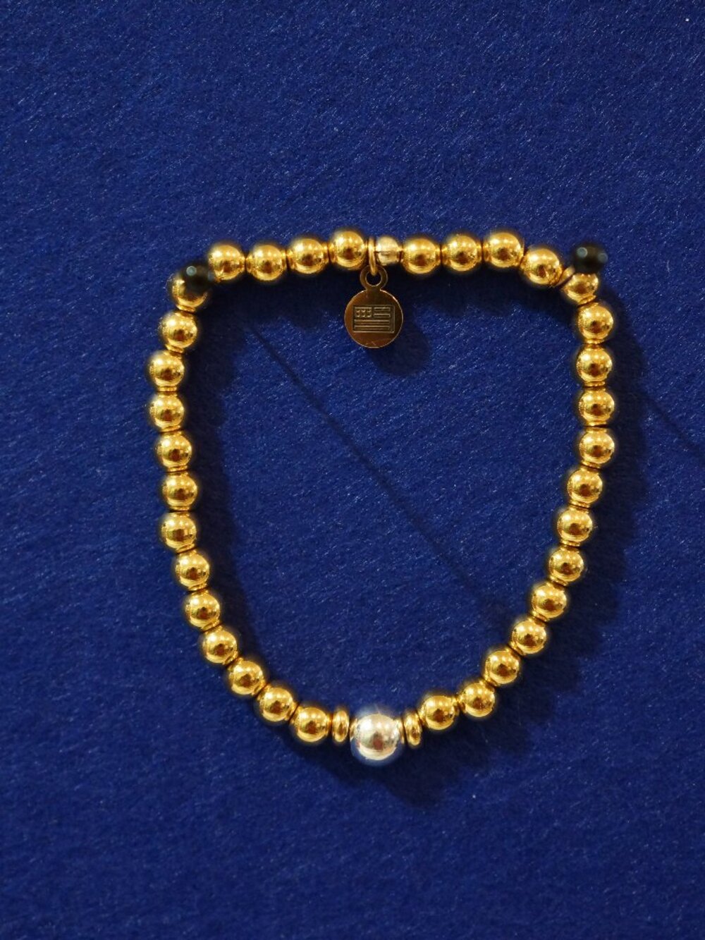 Tommy Hilfiger Gold Beaded Stretch Bracelet TH Monogram Logo Charm